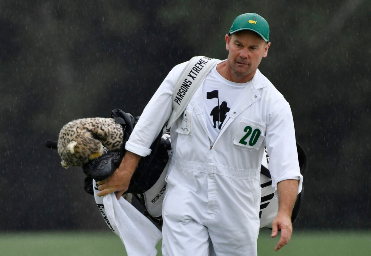 The Masters Why do caddies wear white jumpsuits? Caddie Network